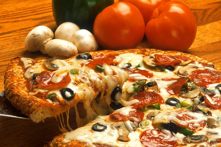 Dish,Food,Cuisine,Pizza,Ingredient,Pizza cheese,California-style pizza,Italian food,Produce,Recipe