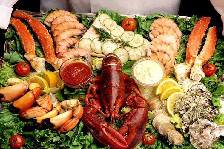 Dish,Food,Cuisine,Platter,Seafood,Spiny lobster,Ingredient,Delicacy,Crudités,Seafood boil