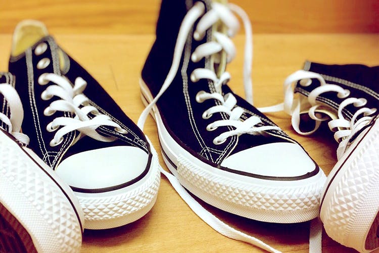 Shoe,Footwear,Sneakers,White,Black,Walking shoe,Plimsoll shoe,Athletic shoe,Font,Skate shoe