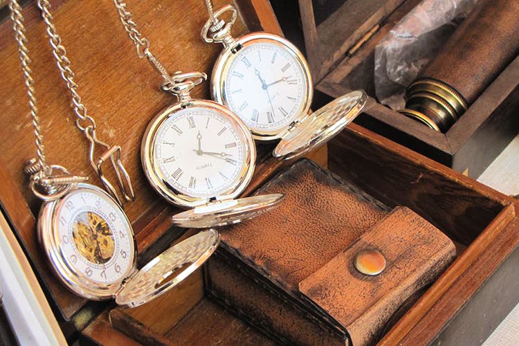 Pocket watch,Watch,Compass,Antique,Fashion accessory,Copper,Jewellery,Metal,Still life photography