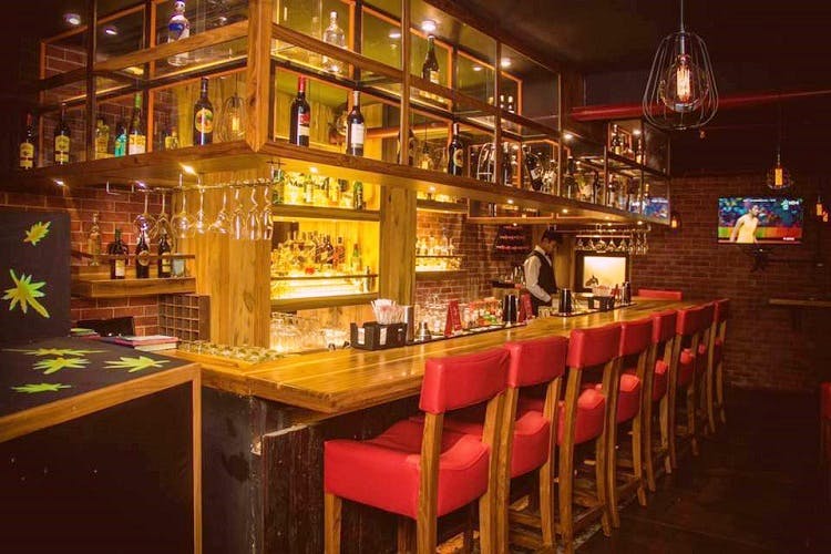 Drinking establishment,Bar,Pub,Building,Room,Table,Night,Restaurant,Tavern,Furniture