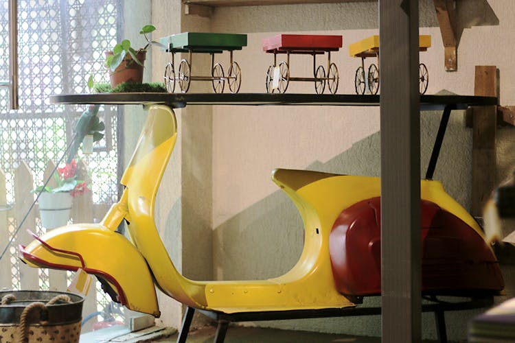 Yellow,Furniture,Room,Table,Interior design,Architecture