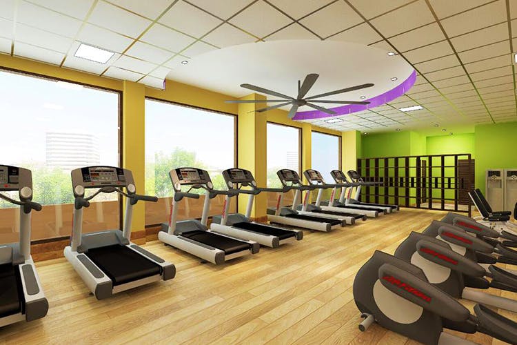 Room,Gym,Physical fitness,Leisure centre,Building,Interior design,Sport venue,Floor,Flooring,Treadmill