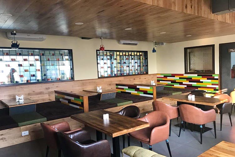 Room,Building,Interior design,Classroom,Restaurant,Architecture,Furniture,Table,Cafeteria,Ceiling