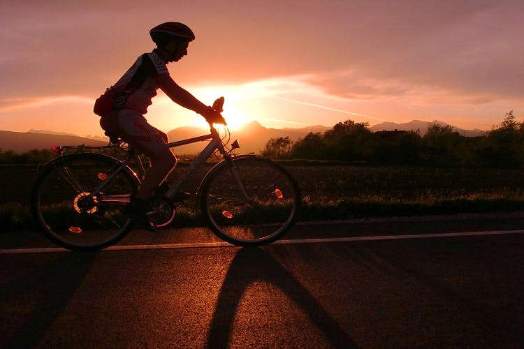 Cycling,Sky,Bicycle,Cycle sport,Vehicle,Recreation,Sunset,Cloud,Evening,Bicycle accessory