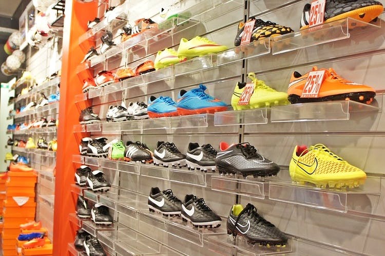 Shoe store,Footwear,Shoe,Retail,Building,Athletic shoe,Vehicle