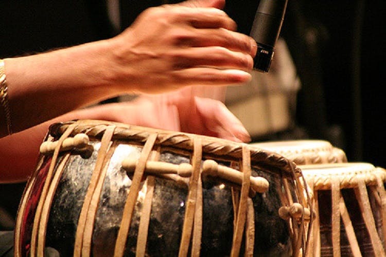 Drum,Tabla,Musical instrument,Hand drum,Membranophone,Percussion,Percussionist,Percussion mallet,Chenda,Hand