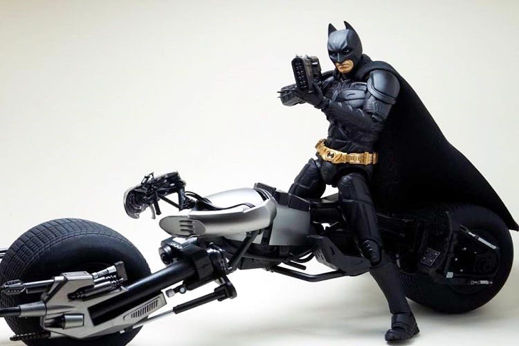 Batman,Action figure,Toy,Fictional character,Supervillain,Vehicle,Motorcycle,Superhero,Justice league,Wheel