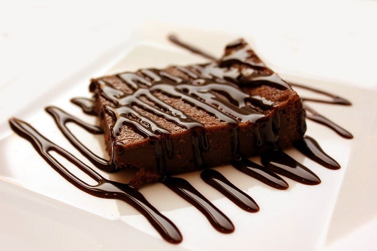 Food,Dish,Chocolate cake,Chocolate brownie,Chocolate,Cuisine,Dessert,Chocolate syrup,Ingredient,Flourless chocolate cake