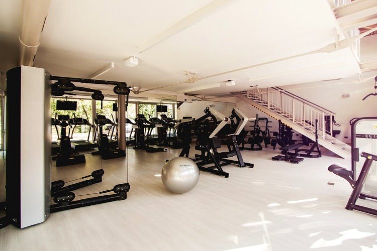 Gym,Physical fitness,Room,Sport venue,Exercise,Crossfit,Exercise equipment,Flooring,Leisure centre,Building