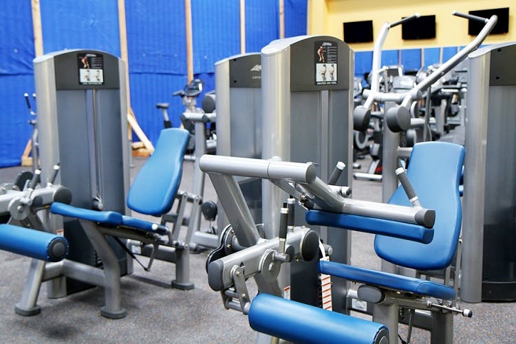 Gym,Sport venue,Room,Leg extension,Pumping station,Bench,Exercise equipment,Pipe,Weightlifting machine,Gas