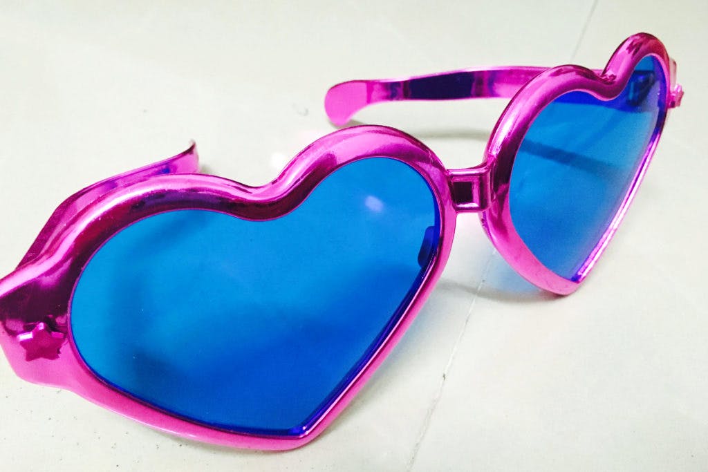 Eyewear,Glasses,Sunglasses,Pink,Personal protective equipment,Goggles,Magenta,Purple,Heart,Vision care