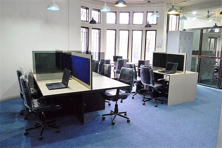 Office,Furniture,Building,Room,Office chair,Interior design,Desk,Table,Technology,Floor