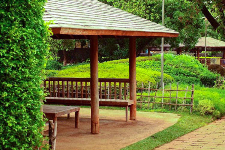 Natural landscape,Pavilion,Botany,Garden,Gazebo,Furniture,Tree,Leisure,Landscaping,Botanical garden