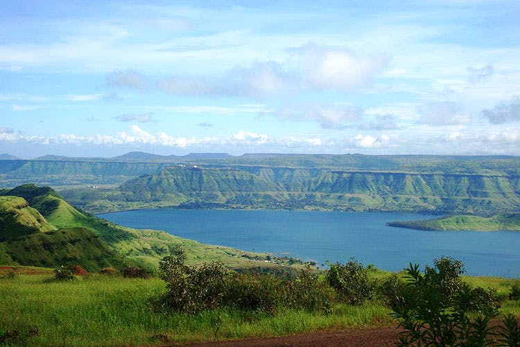 Highland,Natural landscape,Sky,Mountainous landforms,Nature,Mountain,Hill,Wilderness,Lake,Reservoir