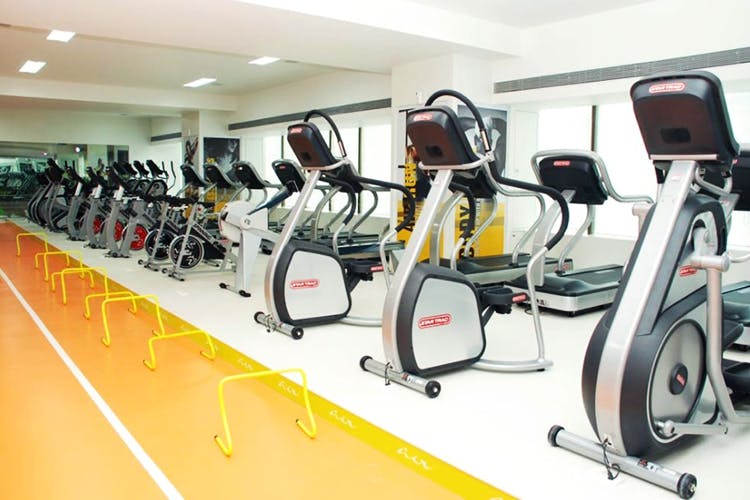 Exercise machine,Exercise equipment,Gym,Stationary bicycle,Room,Treadmill,Indoor cycling,Physical fitness,Leisure centre,Elliptical trainer