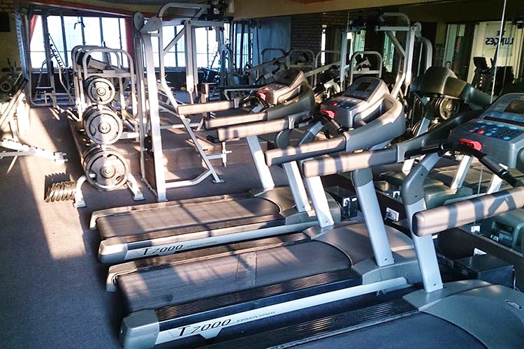 Treadmill,Gym,Exercise machine,Exercise equipment,Room,Sport venue,Physical fitness,Sports equipment,Leisure,Exercise