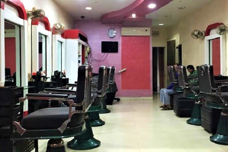 Beauty salon,Gym,Room,Salon,Interior design,Building,Flooring,Floor,Furniture,Barber chair
