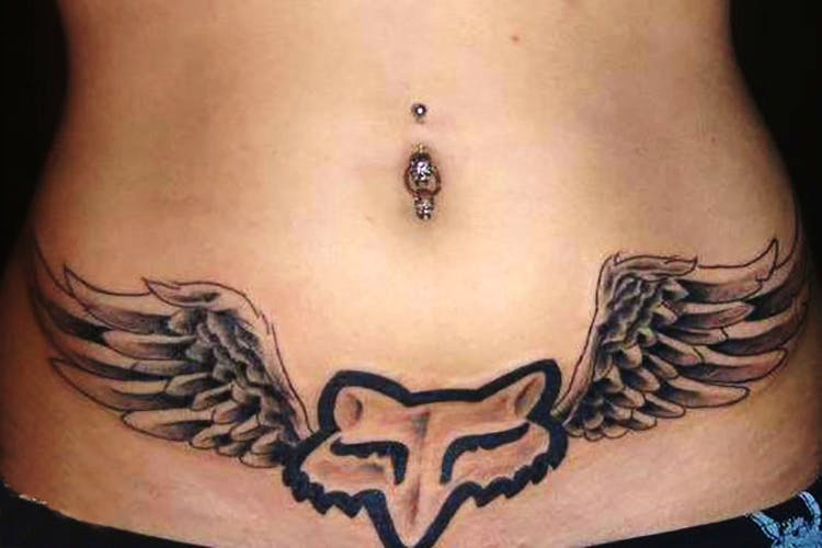 Tattoo,Stomach,Neck,Wing,Abdomen,Skin,Trunk,Back,Organ,Arm