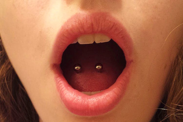 Lip,Tongue,Tooth,Nose,Face,Mouth,Chin,Cheek,Skin,Close-up