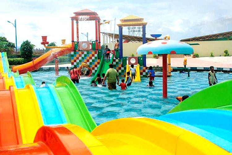 Water park,Fun,Leisure,Amusement park,Chute,Public space,Aqua,Playground,Outdoor play equipment,Recreation