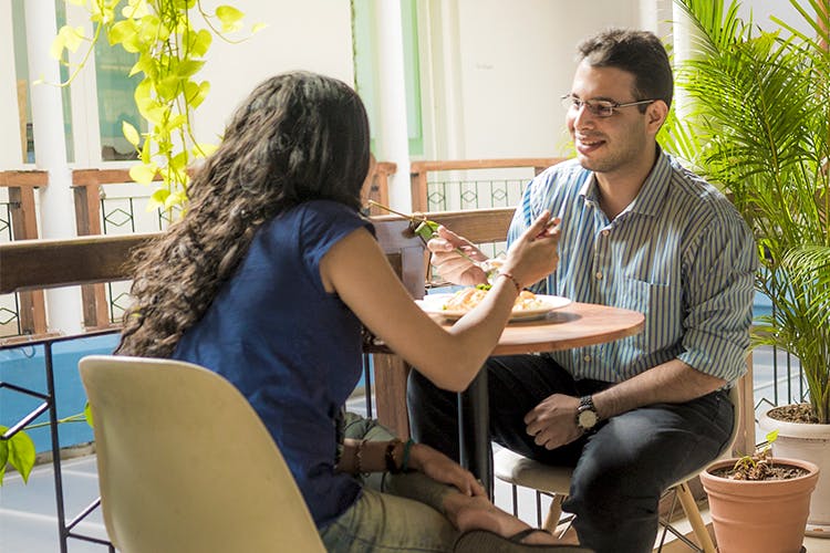 Conversation,Sitting,Interaction,Table,Furniture,Adaptation,Interior design,Leisure,Home,House