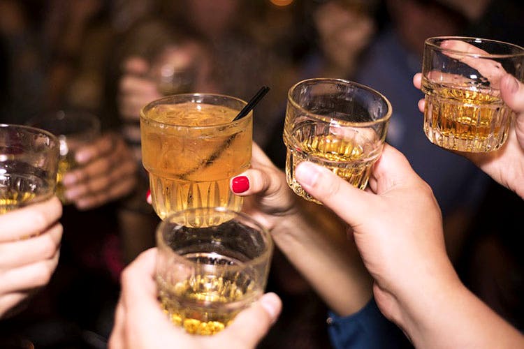 Drink,Alcohol,Alcoholic beverage,Distilled beverage,Liqueur,Beer,Whisky,Hand,Drinkware,Cocktail