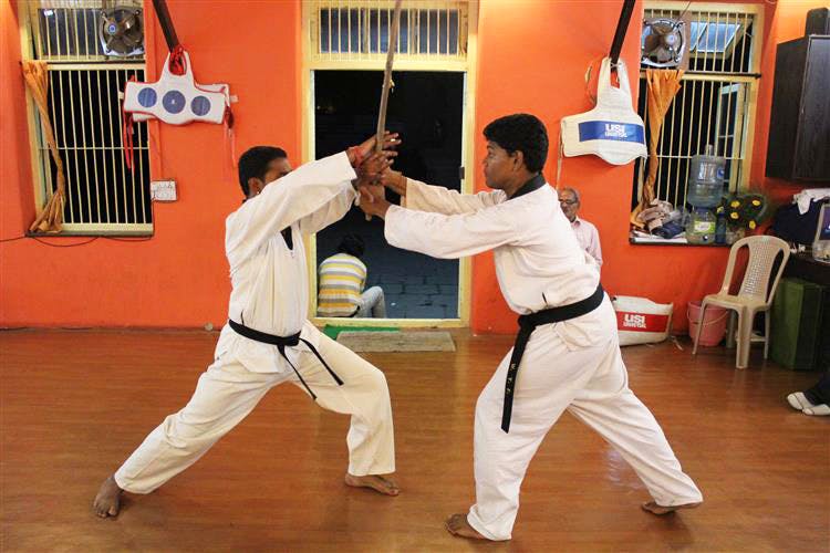 Sports,Dobok,Martial arts,Karate,Contact sport,Combat sport,Individual sports,Kick,Japanese martial arts,Tang soo do