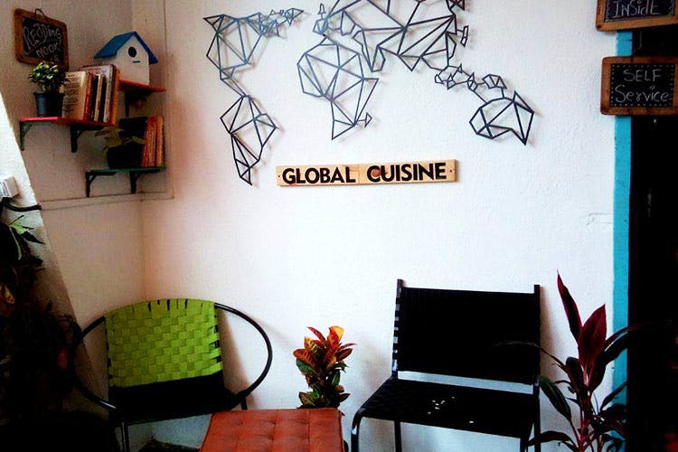 Room,Wall,Furniture,House,Living room,Interior design,Houseplant,Building,Chair,Table