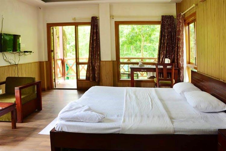 Bedroom,Room,Furniture,Property,Bed,Bed frame,Bed sheet,Building,Interior design,Mattress