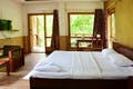 Bedroom,Room,Furniture,Property,Bed,Bed frame,Bed sheet,Building,Interior design,Mattress