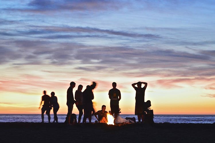 People on beach,People in nature,Sky,Photograph,People,Horizon,Sunset,Fun,Beach,Friendship