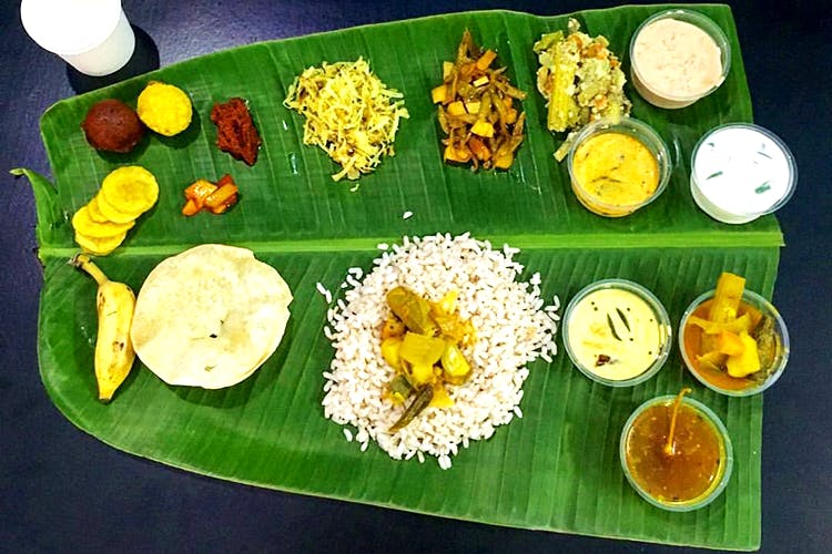 Dish,Food,Cuisine,Sadya,Banana leaf,Ingredient,Andhra food,Rice,Vegetarian food,Meal