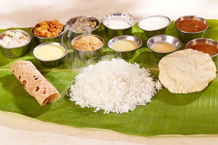 Dish,Food,Cuisine,Sadya,Banana leaf rice,Ingredient,Andhra food,Tamil food,Meal,Steamed rice
