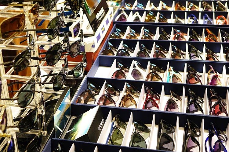 Shoe store,Collection,Footwear,Eyewear,Shoe,Glasses