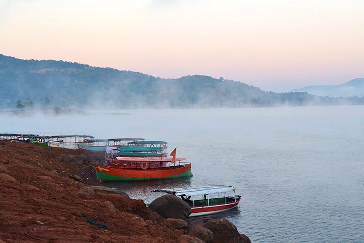 Vehicle,Water transportation,Atmospheric phenomenon,Sky,Transport,Mode of transport,Car,Fog,Landscape,River