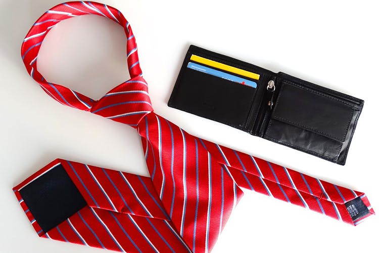 Red,Tie,Fashion accessory,Wallet,Technology