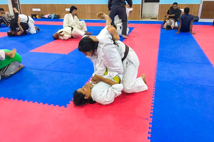 Blue,Dobok,Martial arts,Hapkido,Red,Individual sports,Taekwondo,Brazilian jiu-jitsu,Sports,Judo