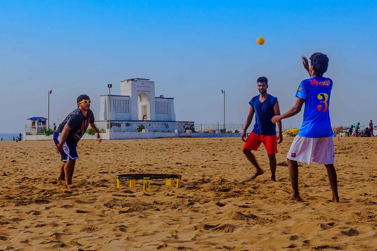 Beach,Sports,Sand,Beach volleyball,Team sport,Ball game,Volleyball,Ball,Volleyball player,Sky