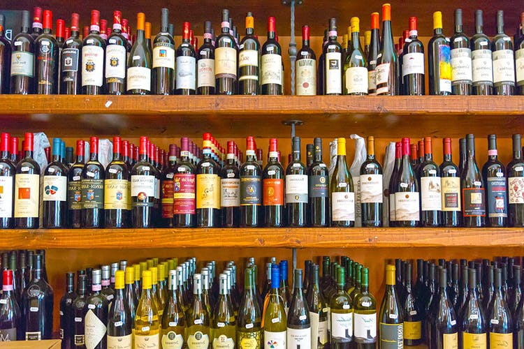 Bottle,Alcohol,Distilled beverage,Liquor store,Drink,Liqueur,Glass bottle,Alcoholic beverage,Wine bottle,Wine