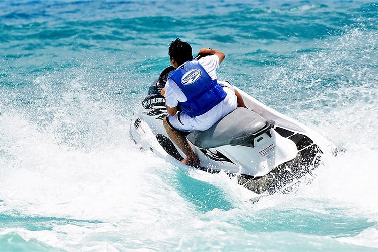 Jet ski,Personal water craft,Boating,Outdoor recreation,Recreation,Water sport,Vehicle,Sports,Wind wave,Wave