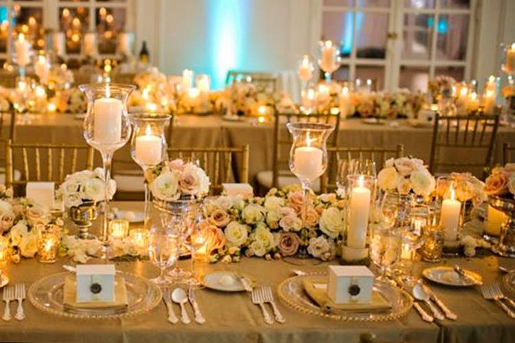 Wedding banquet,Decoration,Centrepiece,Rehearsal dinner,Function hall,Wedding reception,Floral design,Yellow,Flower Arranging,Lighting
