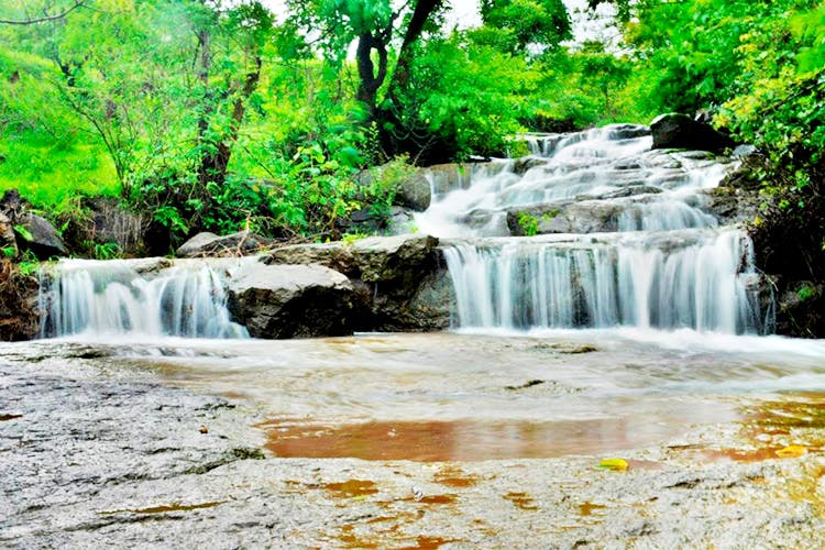 Waterfall,Water resources,Body of water,Natural landscape,Nature,Water,Watercourse,Nature reserve,Vegetation,Stream