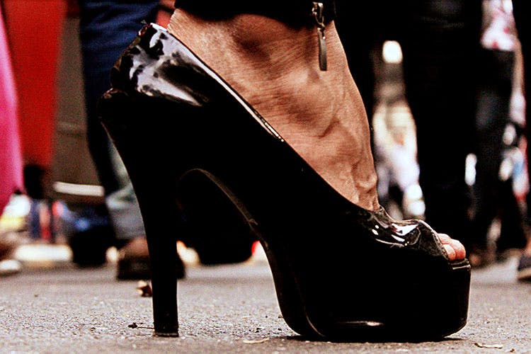 High heels,Footwear,Black,Leg,Shoe,Human leg,Street fashion,Fashion,Ankle,Foot
