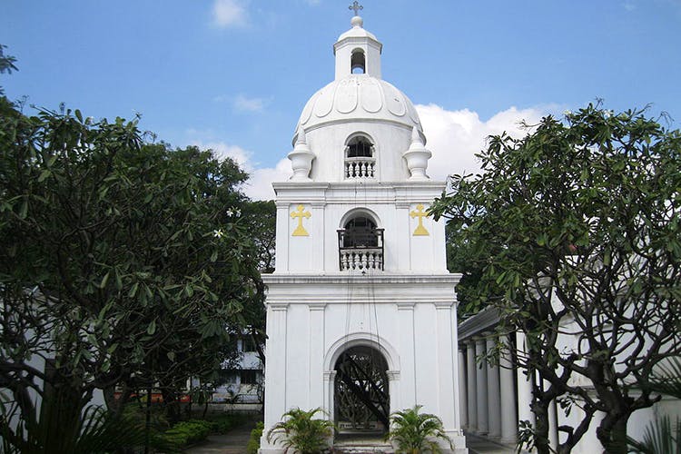 Landmark,Place of worship,Building,Sky,Architecture,Church,Chapel,Tree,Shrine,Mission