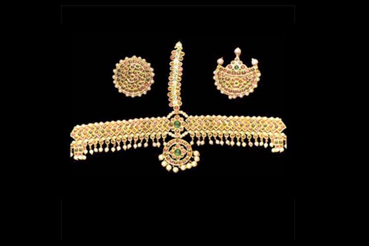 Fashion accessory,Jewellery,Metal,Cross,Gold,Hair accessory,Symbol