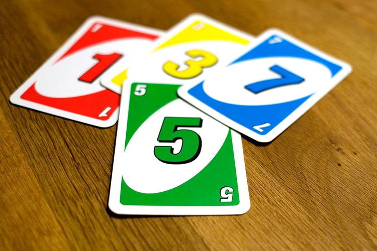 Games,Card game,Font,Number,Recreation,Signage