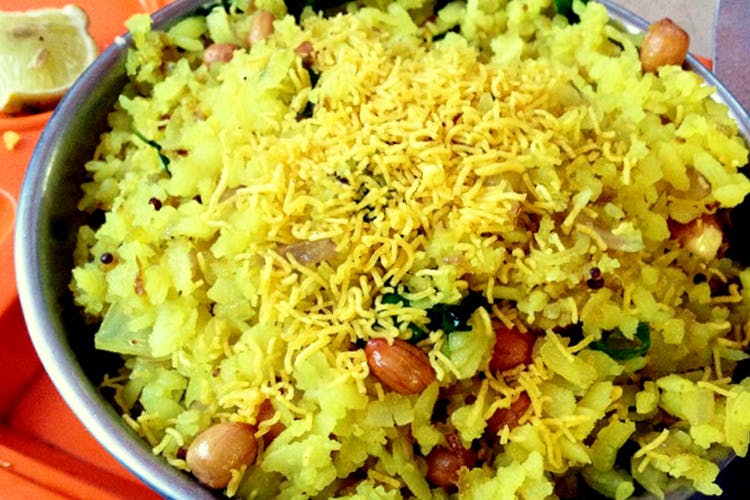 Dish,Cuisine,Food,Spiced rice,Ingredient,Rice,Biryani,Produce,Saffron rice,Pulihora