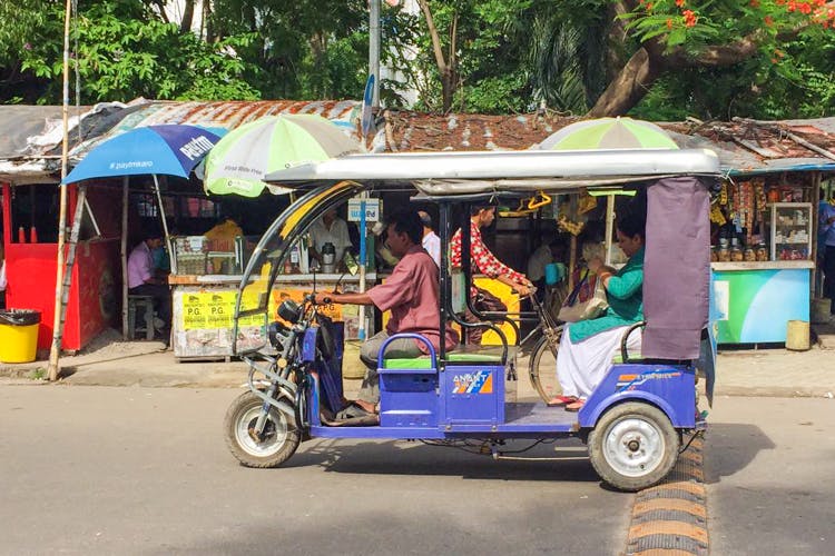 Mode of transport,Vehicle,Transport,Rickshaw,Motor vehicle,Cart,Car,Peddler
