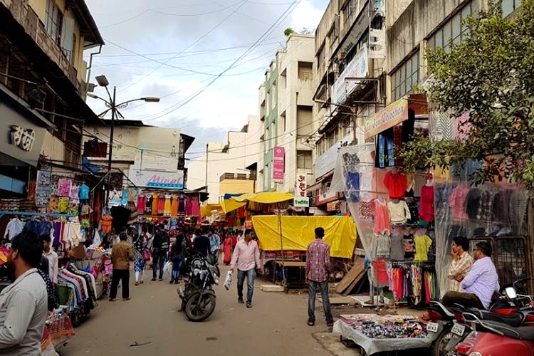 Marketplace,Bazaar,Market,Town,Street,Mode of transport,Public space,Human settlement,Neighbourhood,City